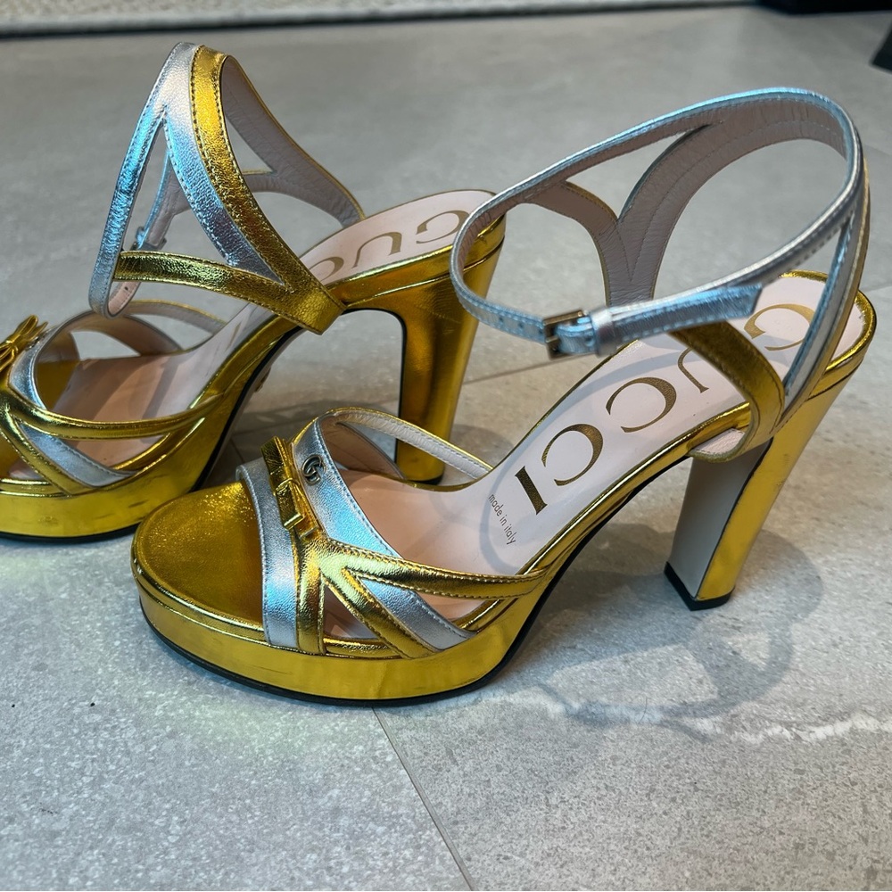 Gucci!! Gold and silver metallic platform heels.